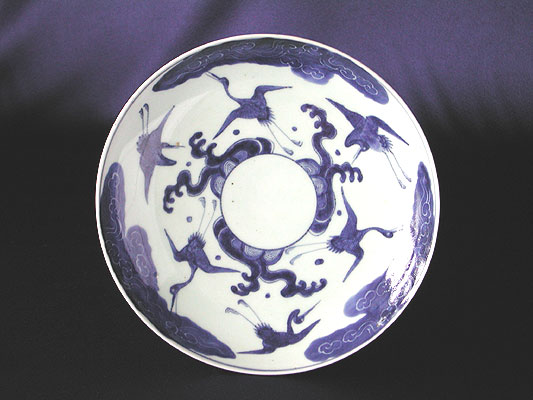 Small plate with design of cranes and high waves, Old Imari porcelain